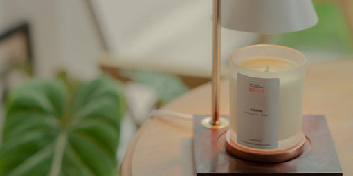 white candle warmer with a LUMI scented candle