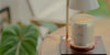 white candle warmer with a LUMI scented candle