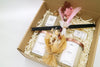 Lumi Candles PH products and dried flowers wrapped in a LUMI gift box