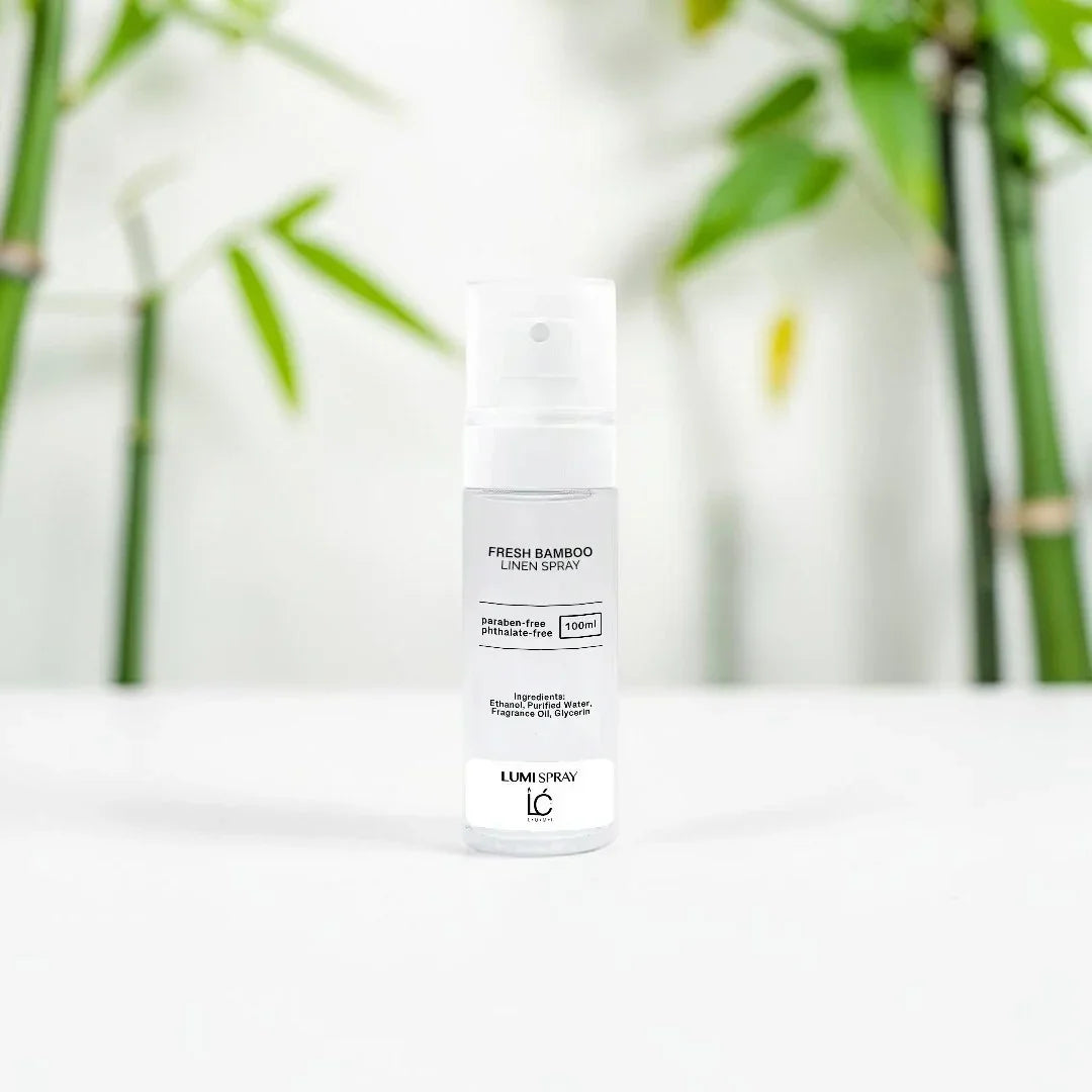 Fresh Bamboo LUMI Room and Linen Spray (100ml) bottle styled with a decorative background