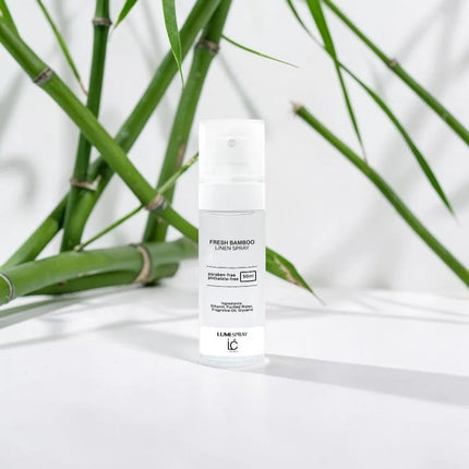 Fresh Bamboo LUMI Room and Linen Spray (50ml) bottle styled with a decorative background