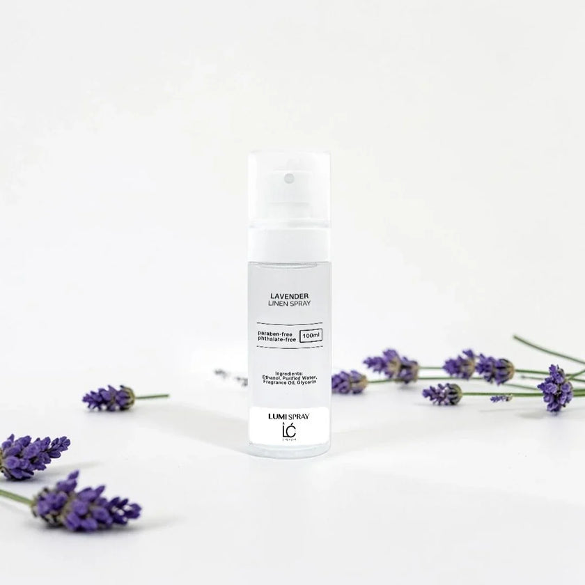 Lavender LUMI Room and Linen Spray (100ml) bottle styled with a decorative background