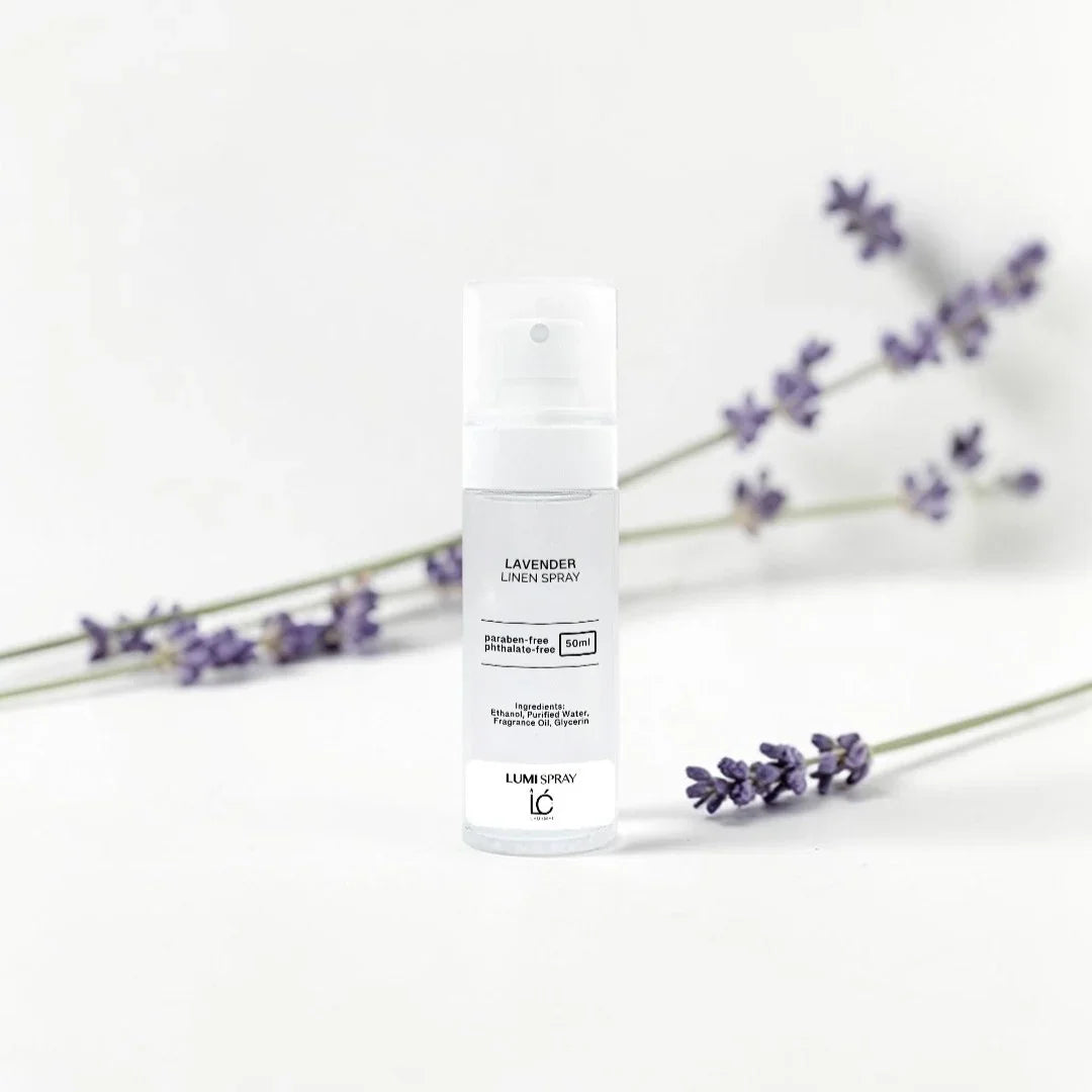 Lavender LUMI Room and Linen Spray (50ml) bottle styled with a decorative background