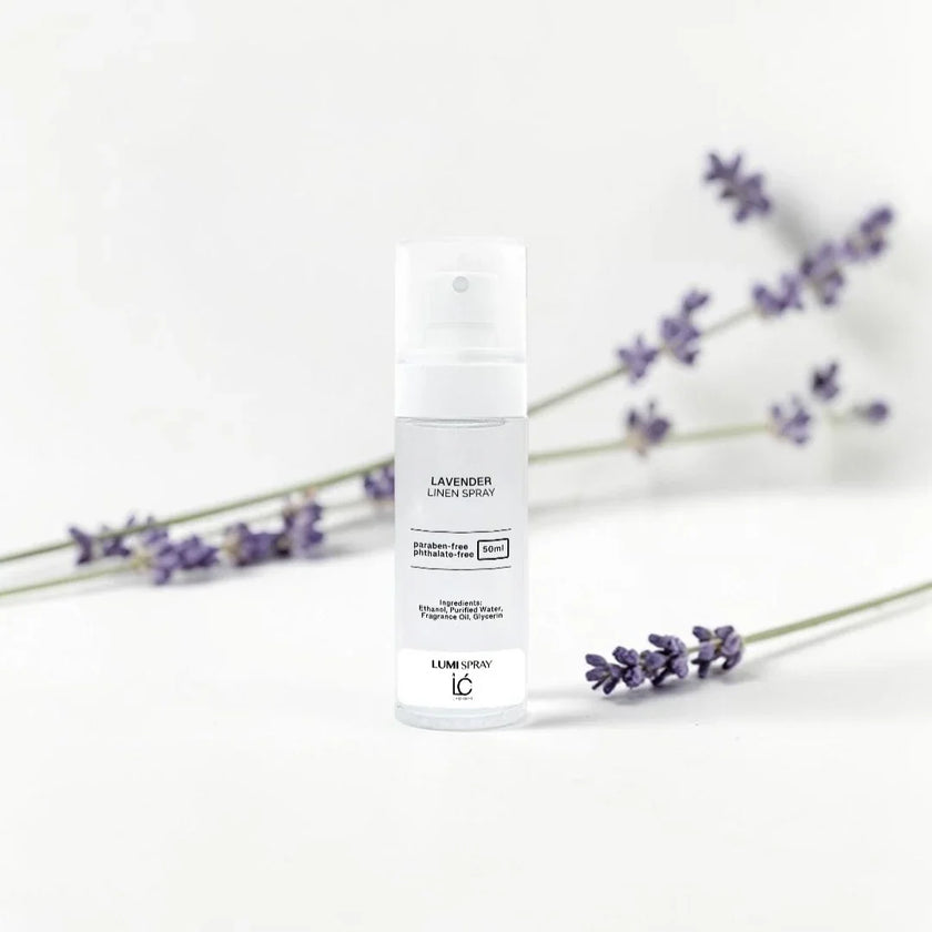 Lavender LUMI Room and Linen Spray (50ml) bottle styled with a decorative background