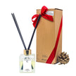 Lavender LUMI Reed Diffuser bottle wrapped with a red ribbon for bulk gifting