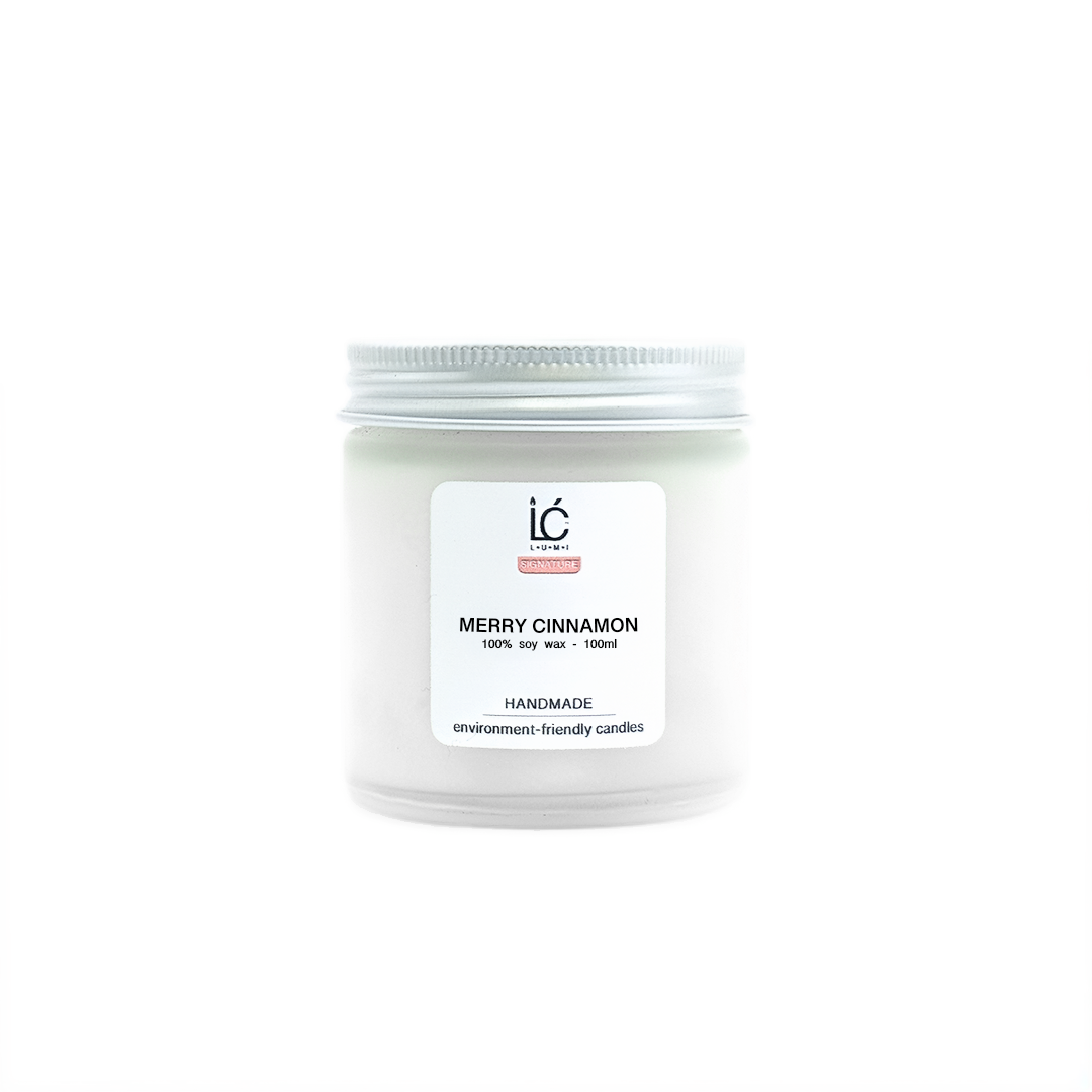 Merry Cinnamon Scented Soy Candle (100ml) in its frosted glass jar with the lid on