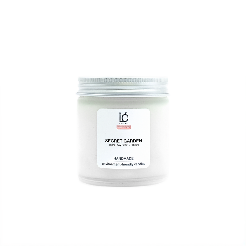 Secret Garden Scented Soy Candle (100ml) in its frosted glass jar with the lid on