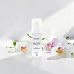 Secret Garden LUMI Room and Linen Spray (50ml) bottle styled with a decorative background