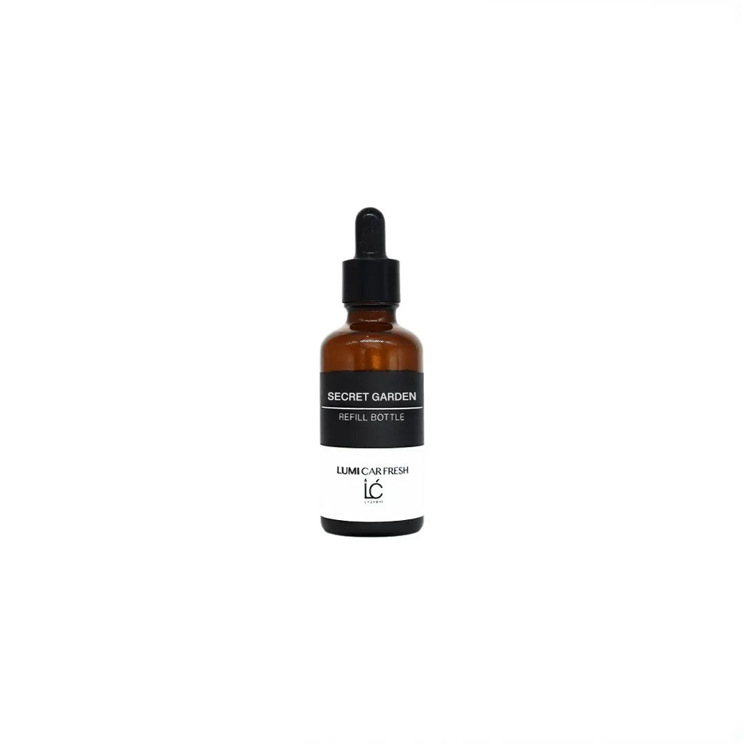 Secret Garden LUMI Car Freshener Refill oil bottle, capped, product shot on a plain background