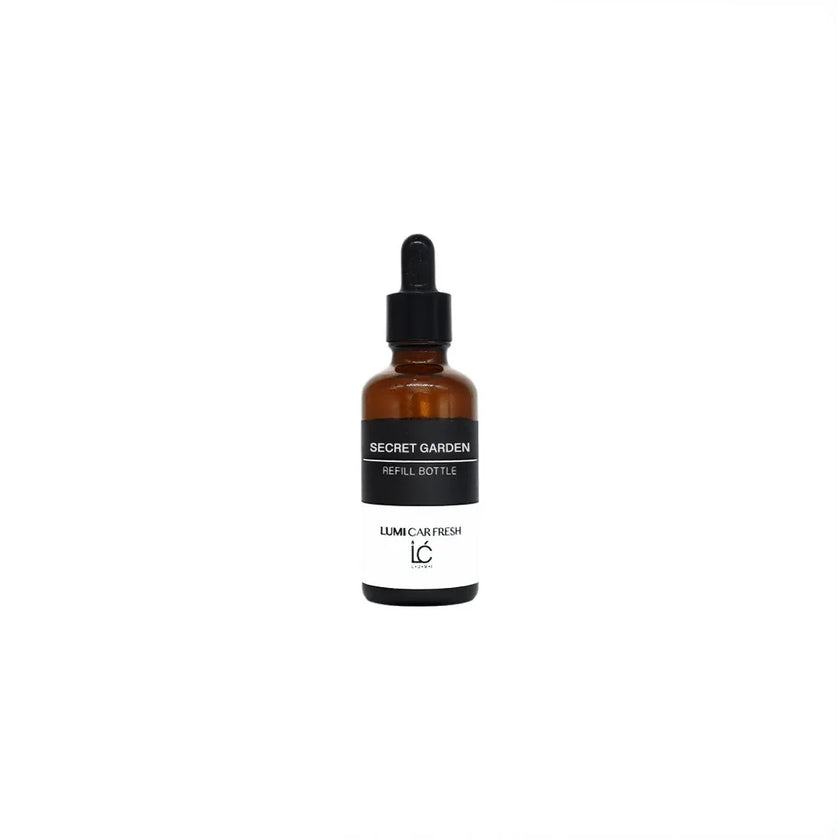 Secret Garden LUMI Car Freshener Refill oil bottle, capped, product shot on a plain background