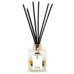 Secret Garden LUMI Reed Diffuser bottle with reed sticks on a white background