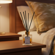 Amber Love LUMI Reed Diffuser styled in a home lifestyle setting